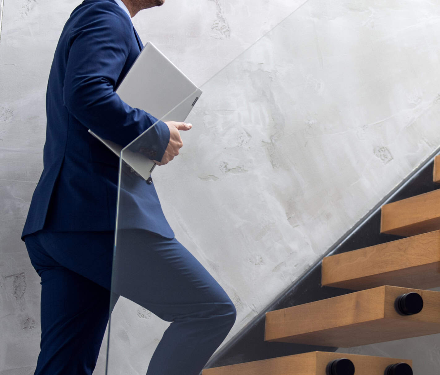 Commercial loans from Finance First: Man walking up stairs